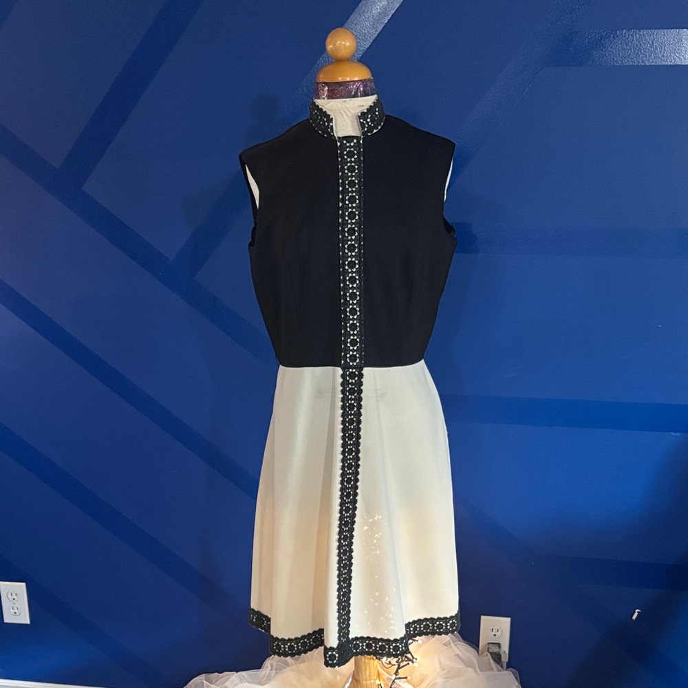 Elegant Black and White Midi Dress with Embellishments